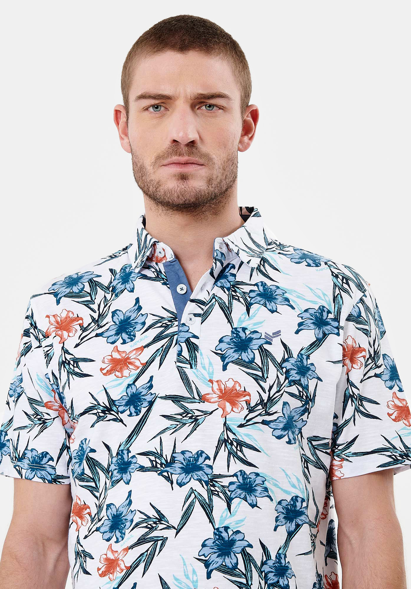 Polo fleuri blanc Homme en 100 coton Never Kaporal